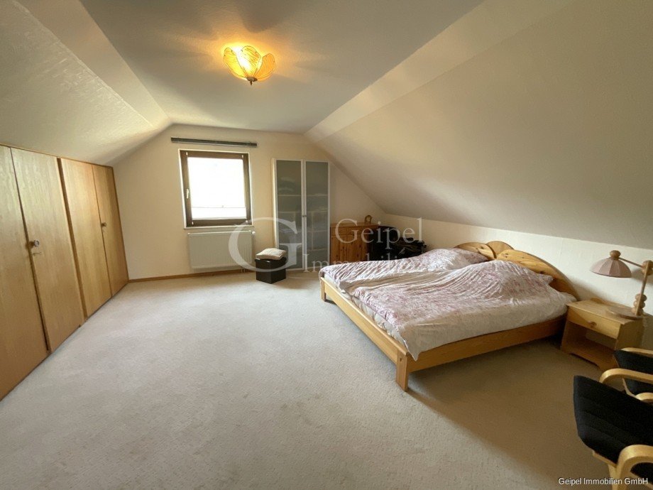 Schlafzimmer im Dachgeschoss Zweifamilienhaus Alfeld (Leine) / Brunkensen
