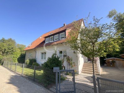 Hauptbild geipel.de - VERKAUFT Zweifamilienhaus mit gepflegtem Garten, Carport und separater Werkstatt